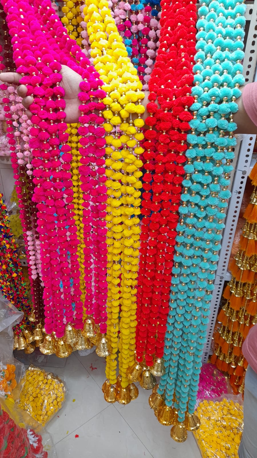 Pom pom Garlands with plastic Gold bell for South Asian wedding and festival decor